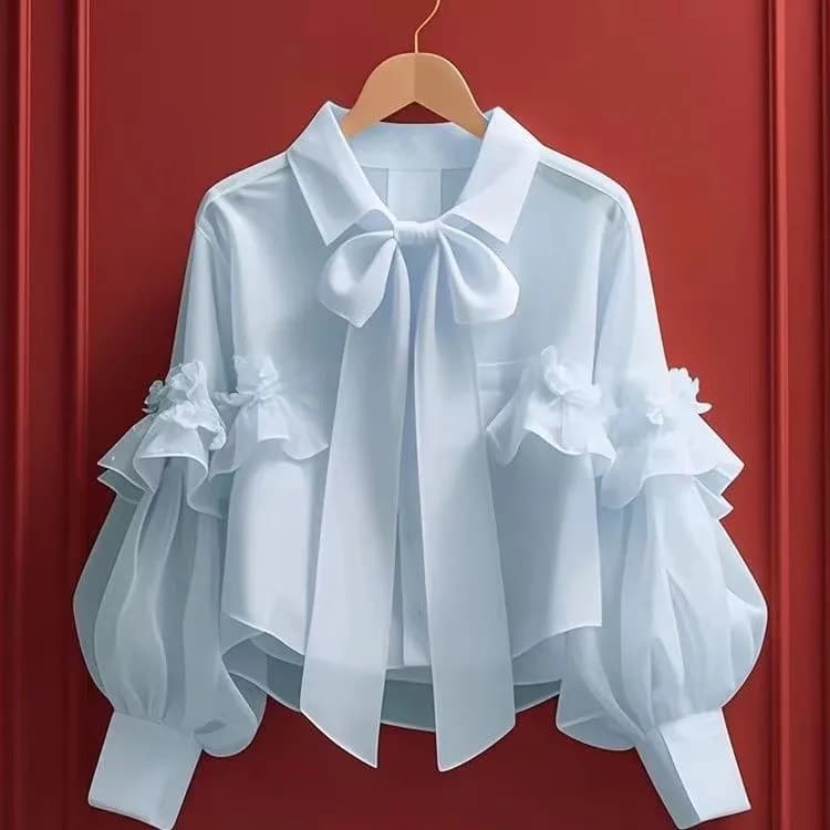 2025 Primavera Autunno Nuove donne francese dolce fiocco blu camicia corta elegante versatile cardigan allentato signore camicetta a maniche lunghe top