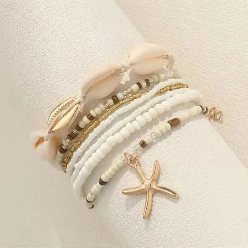 Set di braccialetti con ciondolo stella marina impilabile da 7 pezzi stile spiaggia, gioielli con bracciale a conchiglia multistrato realizzati a mano per le donne
