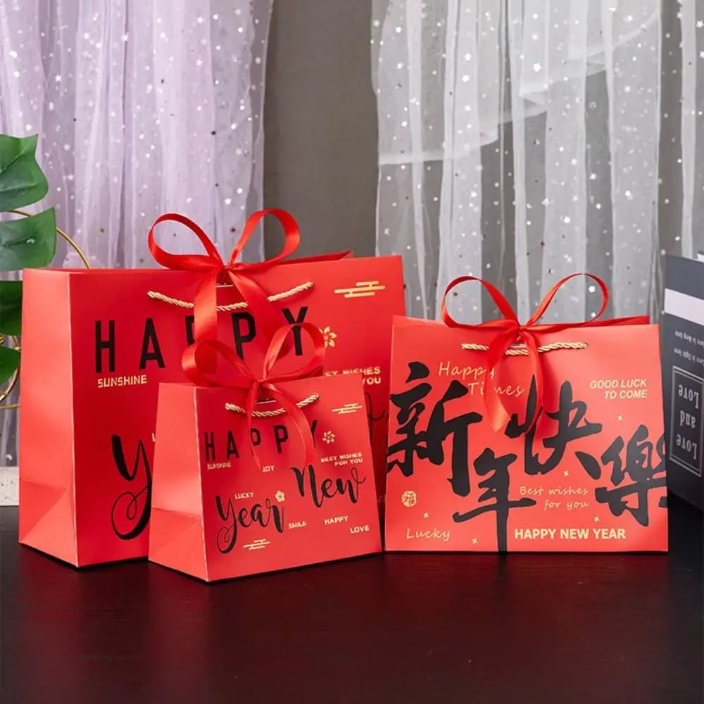 Borsa da imballaggio regalo in carta resistente Nastro con fiocco Borsa da regalo portatile Borsa riutilizzabile con manico per abbigliamento rosso Decorazione per festa di compleanno