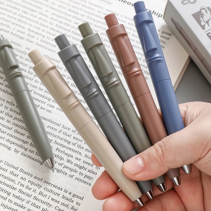 12 penne gel roller retrattili con statua in pietra Moai, ricariche pasquali di grande capacità, inchiostro nero per ufficio, feste scolastiche