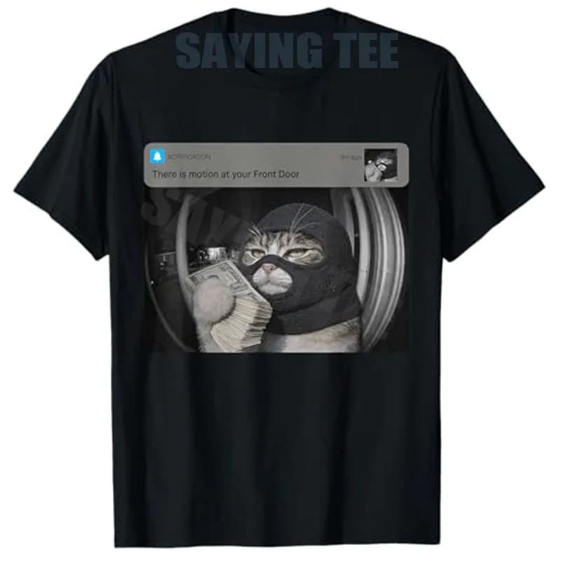 T-shirt estetica Y2K con gatto ladro che appare sulla fotocamera, divertente e umoristica, con grafica di gattino e scritta 'There Is Motion At Your Front Door'