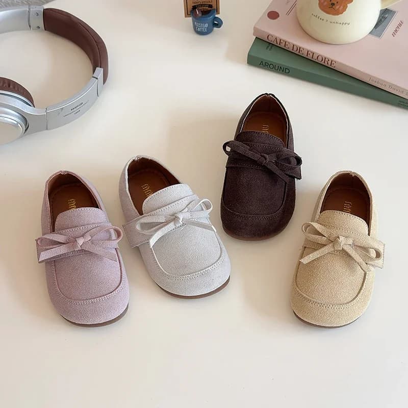 Fashionable shoes for children, leather shoes for girls, British style moccasins for children, suede sneakers for babies and small children, comfortable low shoes.