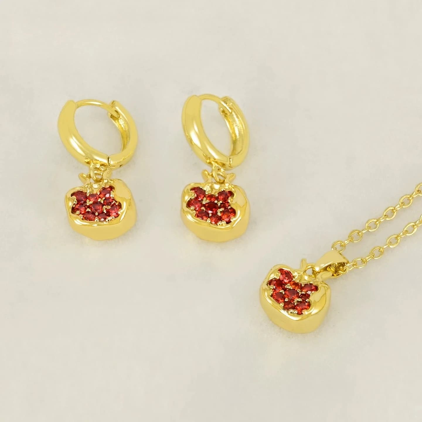 Fruit series gold earrings design sense niche pomegranate ear buckle 2025 new autumn and winter earrings high-end ins