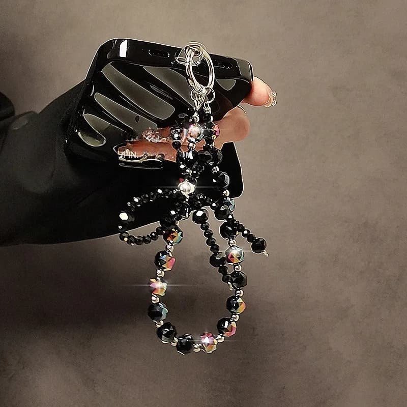 Cordino per telefono in cristallo di lusso con fiocco in rilievo alla moda, ciondolo da polso corto ingioiellato di fascia alta, decorazione a catena appesa a mano