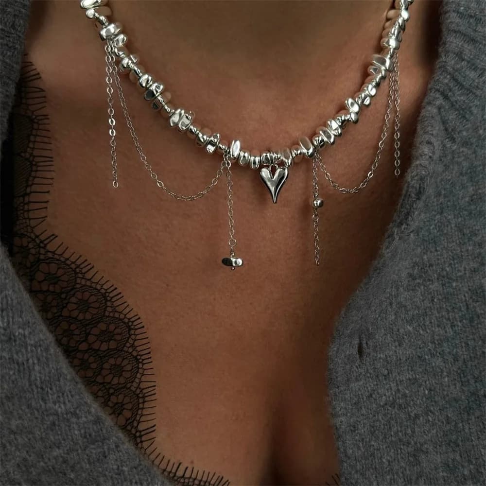 Collana a catena con perline geometriche color argento vintage di moda per gioielli da donna con ciondolo a forma di cuore con nappa Boho femminile