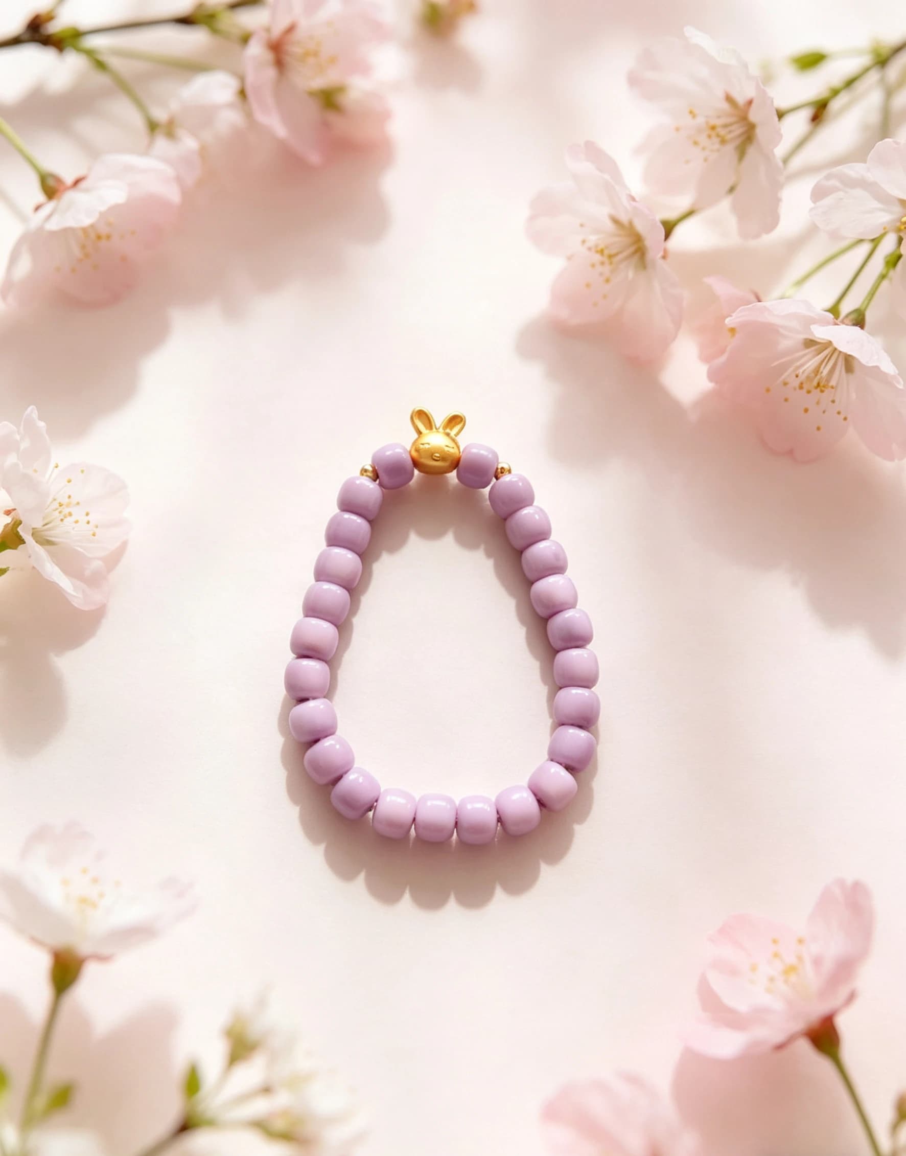 Braccialetto con perline a forma di coniglietto viola