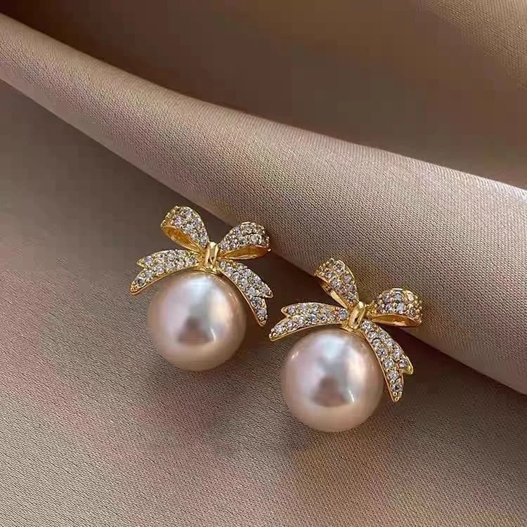 Temperament bow full diamond stud earrings women's versatile exquisite high-end earrings Korean light luxury niche ear jewelry