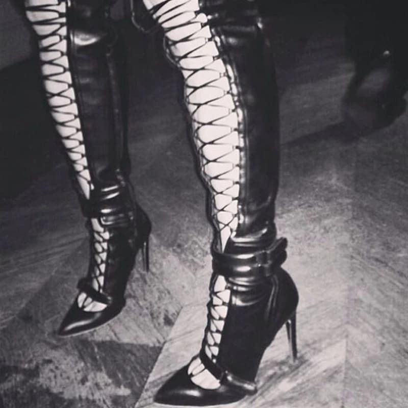 Boots with high heel tightened with fashionable ribbon High knee boots with thin heel in black white leather with pointed tip and strap with buckle