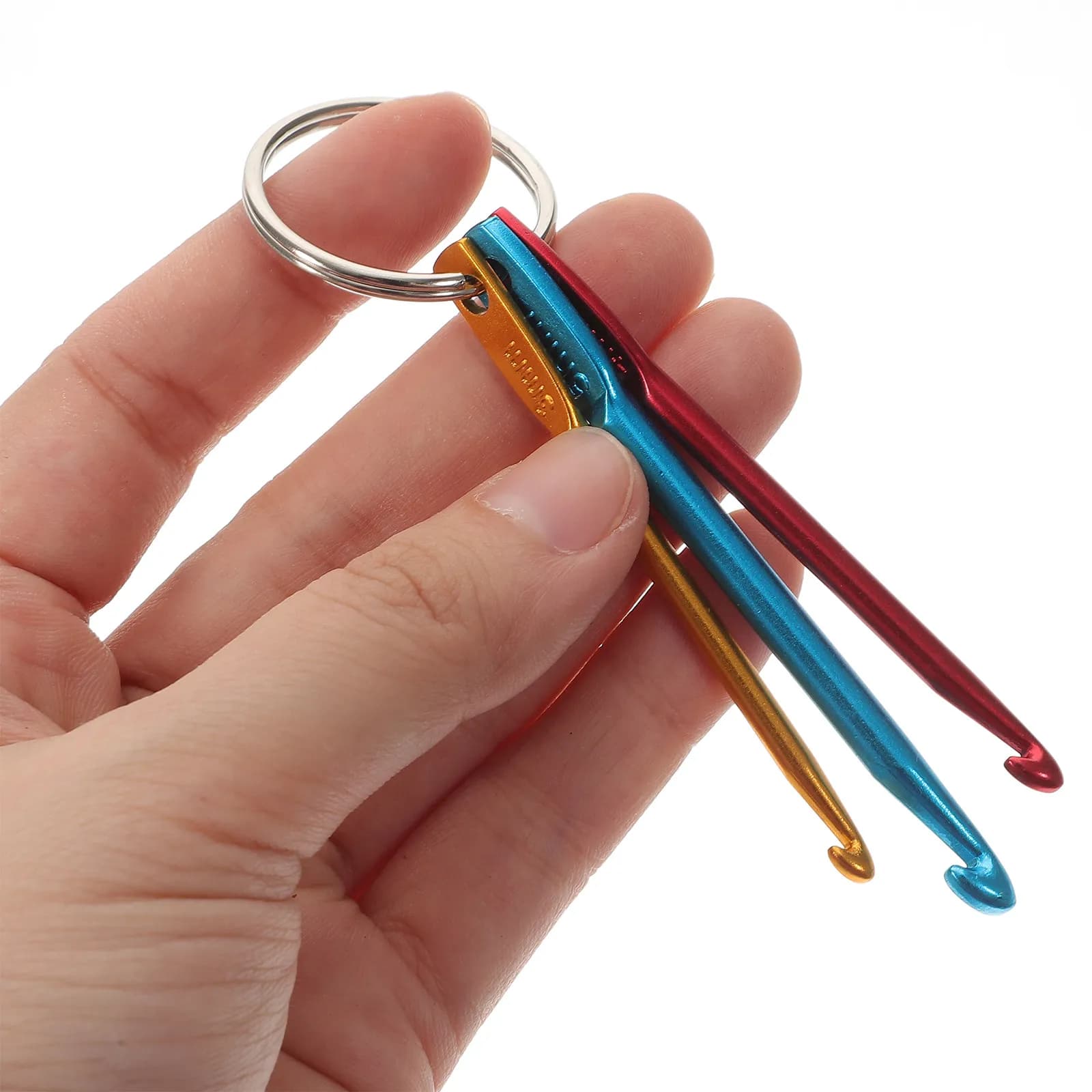 Set di 4 uncinetti compatti in alluminio resistente per lavori a maglia, ideali per realizzare maglioni, cappelli e guanti. Portatile, perfetto per principianti e fai da te.