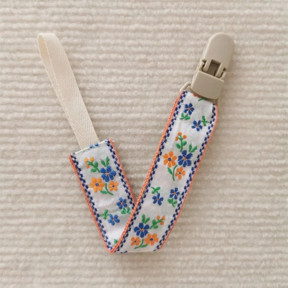 Catena per ciuccio in stoffa per bambini in stile etnico Porta succhietto regolabile floreale Clip per ciuccio Cinghie per giocattoli per massaggiagengive Clip per porta capezzoli