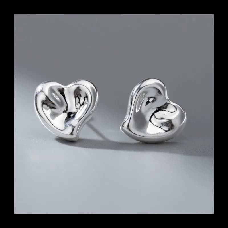 Versione coreana Nicchia Irregolare Concavo-convessa Superficie Amore Orecchini a bottone Femminile Semplice Dolce Versatile Temperamento Design Senso