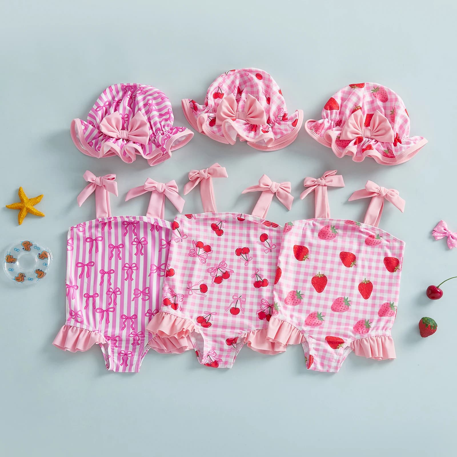 Summer swimsuit for girl with strawberries and cherries print, sleeveless, with knotted shoulder straps, with bath cap included