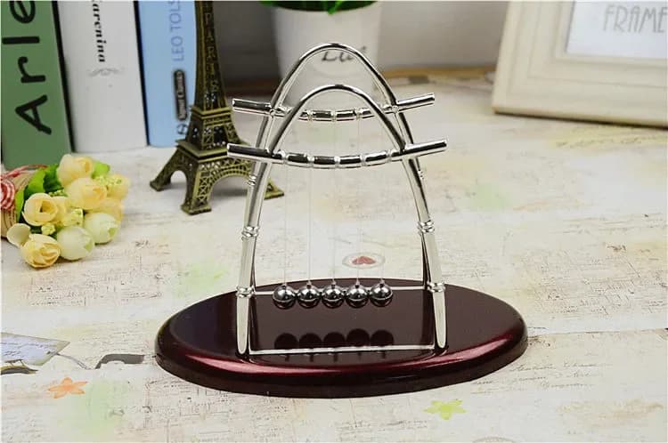 Supporto ad arco Sfere in acciaio Giocattolo educativo per bambini Scrivania artigianale Culla di Newton Sfera di equilibrio Scienza fisica Pendolo Base ovale LZ 003