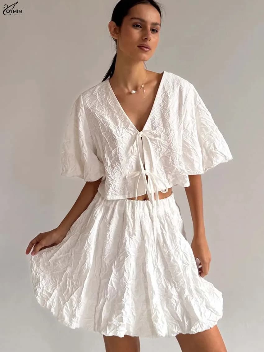 Oymimi Fashion White 2 Pieces Set For Woman Elegant V-Neck Puff Sleeve Lace-Up Crop Blosues And Loose Pleated Mini Skirts Sets