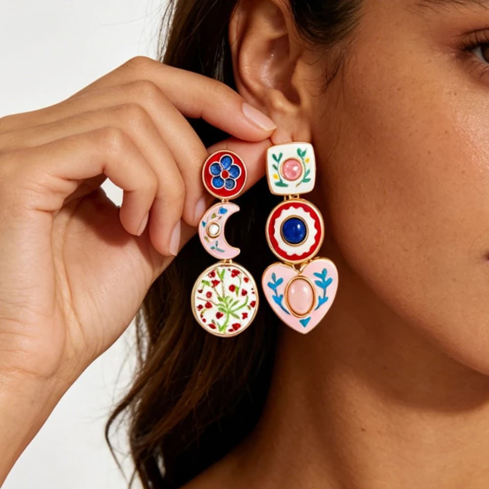Exaggerated artistic retro design with diamond studded heart-shaped pendant, multi-layered earrings with asymmetrical floral embellishments