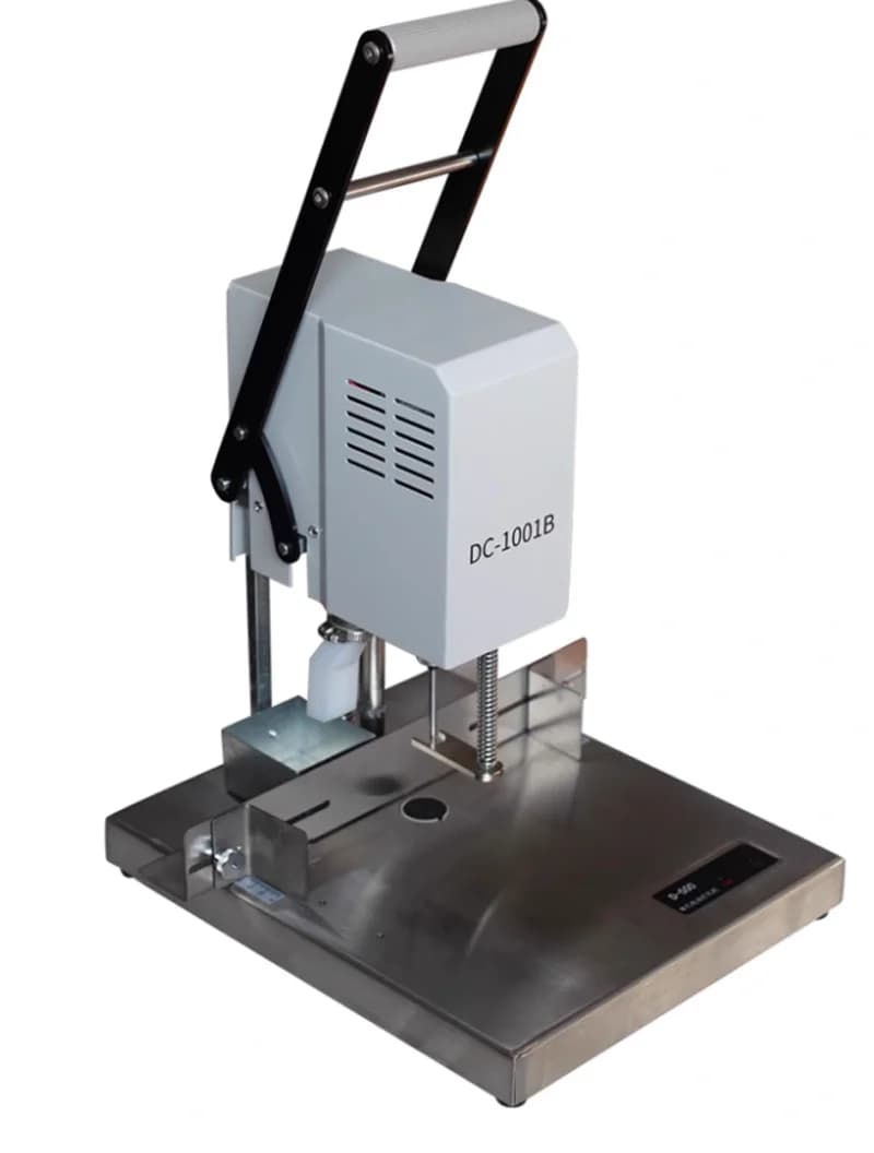 DC-1001B Perforatrice elettrica a foro singolo Punzonatura dati senza sforzo, rilegatrice per file Torsioni di pasta per trapano Punzonatrice per cartelle