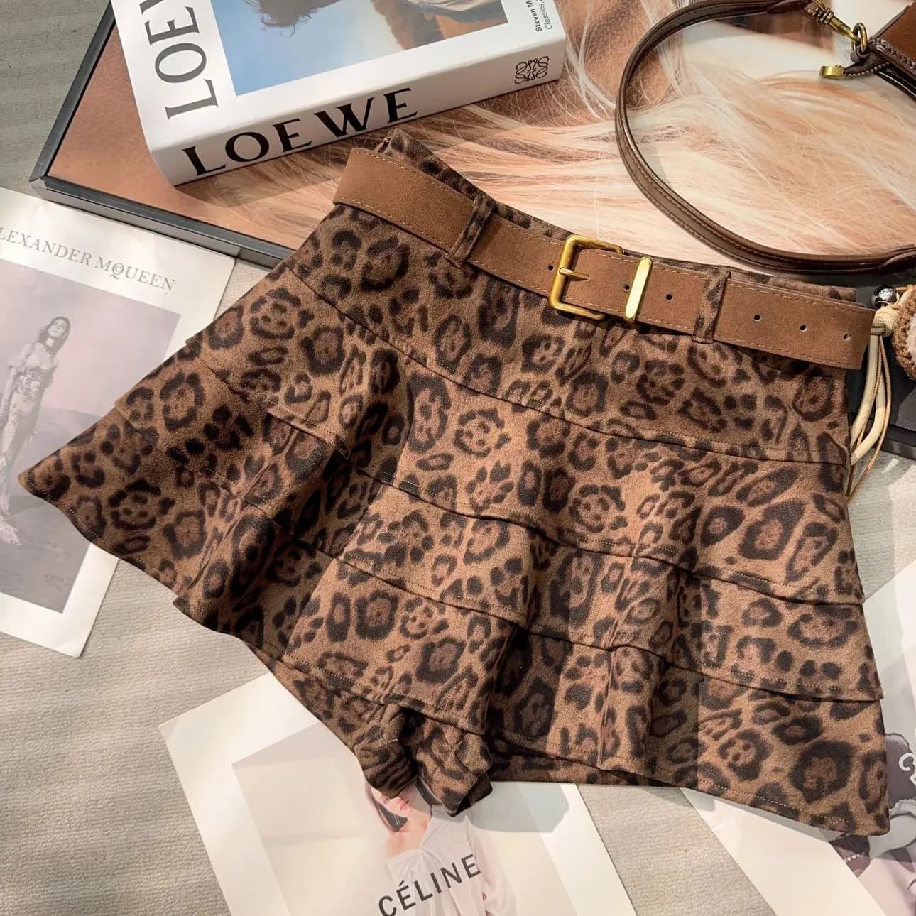 2025 Retro Spicy Girl Autunno e Inverno Nuovo articolo Gonna corta snellente a vita alta con stampa leopardata per donna