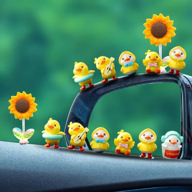1 set di cartoni animati in resina piccola anatra gialla modello console centrale per auto decorazioni ornamenti per auto carini accessori per cruscotto interno auto
