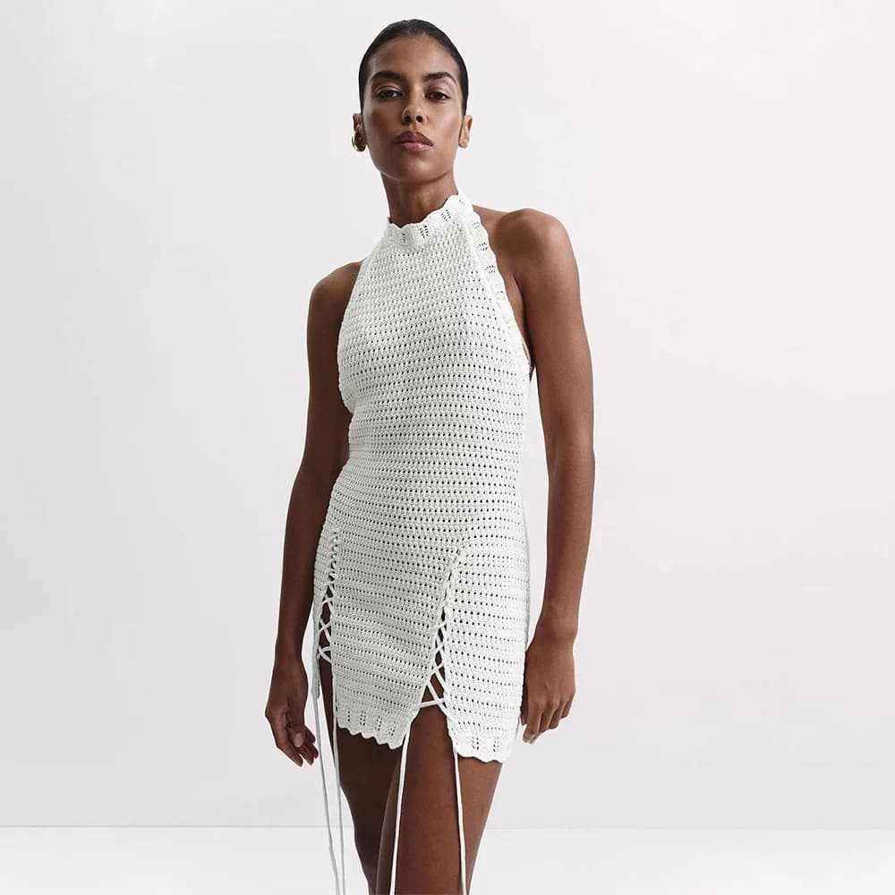 2026 Spring Summer New Knitted Hanging Neck Short Skirt Hook Weaving Hollow Strap Backless Fork Slim Knitted Short Skirt