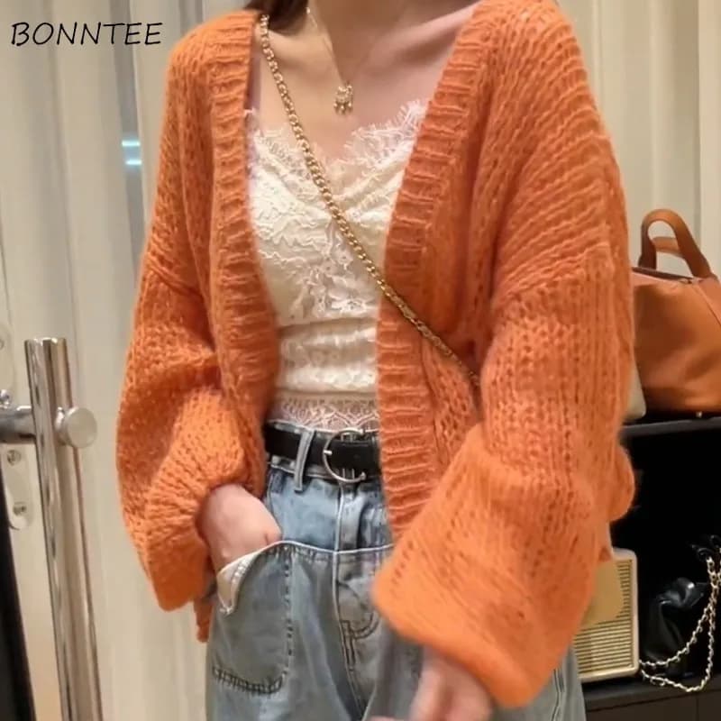 Cardigan arancioni per donne Studenti di colore giovane lavorati a maglia Moda primaverile Design a punto aperto Manica a lanterna allentata Nuovo tutto-fiammifero