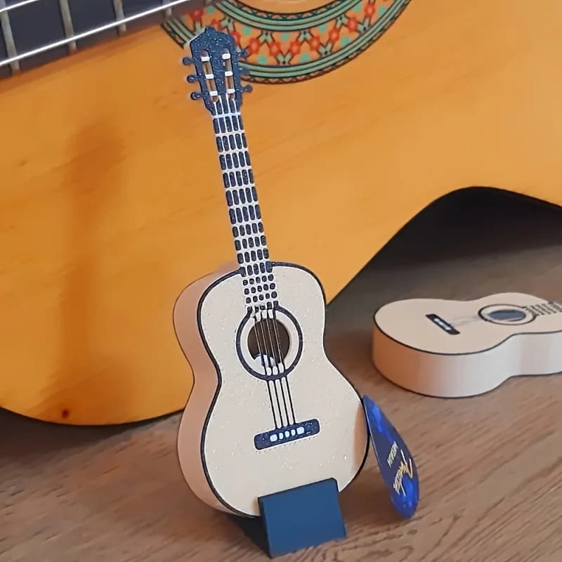 1 pezzo di chitarra in miniatura / mini ukulele con scatola porta plettri, ideale come regalo, per uso domestico, senza plettri.