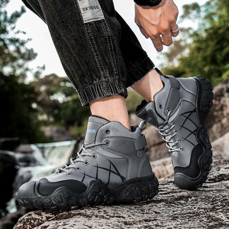 Scarponi da trekking da uomo in vendita calda Sneakers da trekking alte per uomo Comodi stivali da esterno in pelle da uomo Scarpe da passeggio antiscivolo impermeabili