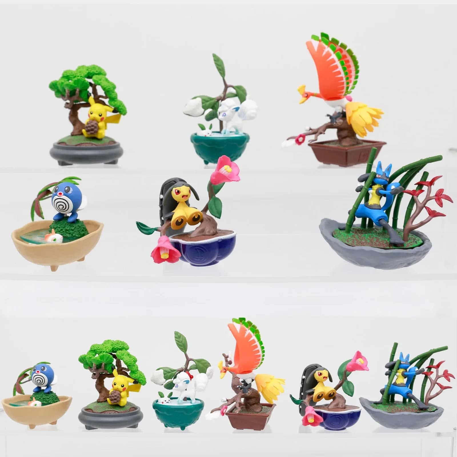 Pokemon in miniatura Bonsai Puntelli di scena Scatola cieca Giocattolo Glaceon Moltres Mawile Lucario Poliwag Pikachu Action Figure Ornamenti da tavolo