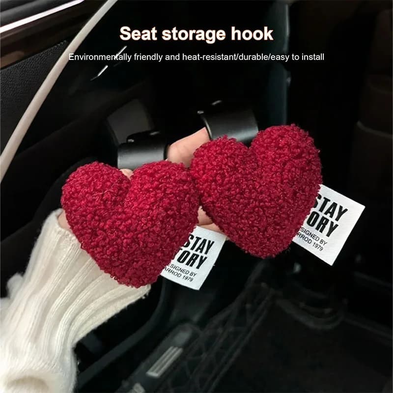 2 car hooks in heart shaped plush: durable seat back hooks and cute for bags and clothes. Easy to install. Perfect car accessories