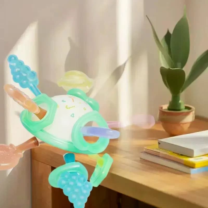 Giocattolo da presa a mano in 1 pezzo per bambini, palla massaggiagengive in silicone Manhattan, ideale per l'apprendimento precoce e il comfort della dentizione.