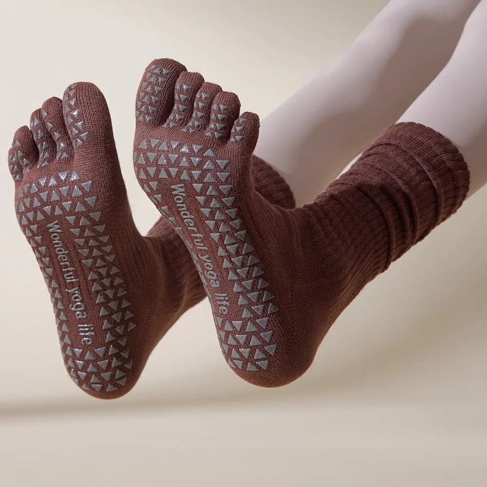 Calzini sportivi a cinque dita separate calzini da yoga da donna a tubo lungo calzini sportivi da pilates in tinta unita antiscivolo in silicone