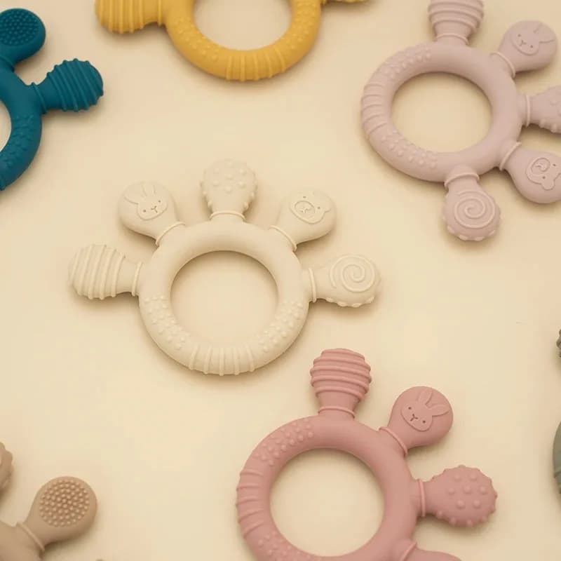Massaggiagengive lenitivo a forma di mano: anello in silicone senza BPA per alleviare le gengive infantili e lo sviluppo delle abilità motorie
