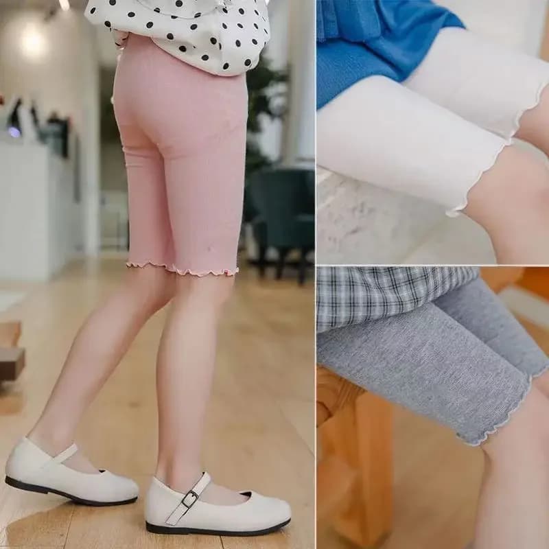 Pantaloni estivi per ragazze Leggings Pantaloni in cotone modale Pantaloni di media lunghezza al ginocchio Tinta unita con volant Legging per vestiti per bambini 3-10 anni