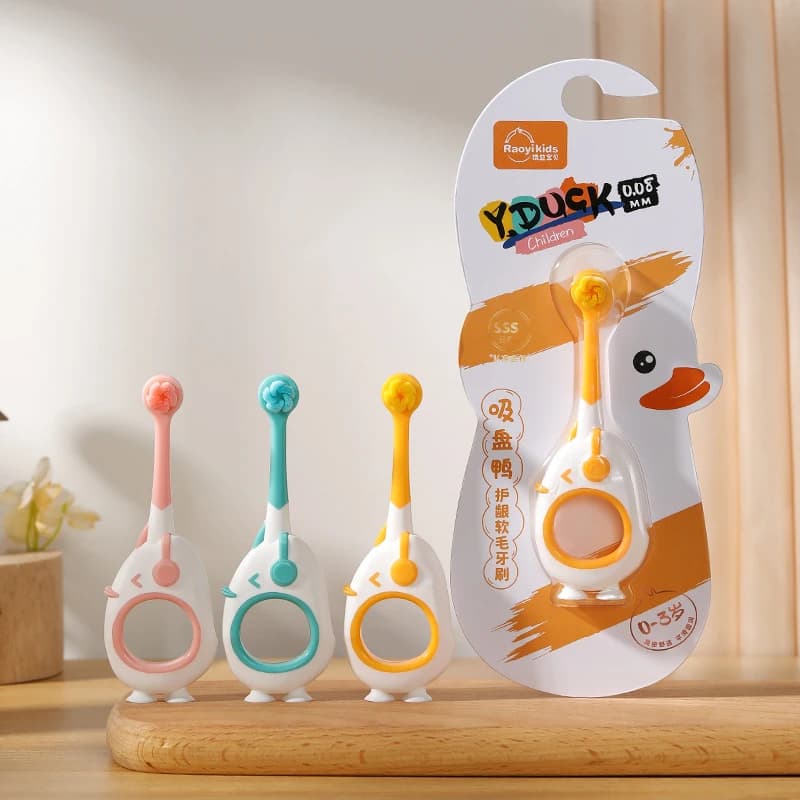 Spazzolino da denti per neonati Simpatico bambino 0-3 anni Cartone animato Testa piccola Spazzolino da denti per bambini Confezionato singolarmente Ventosa inferiore può stare in piedi
