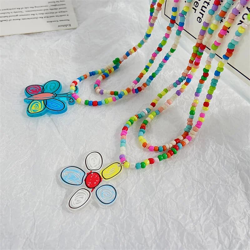 Collana con ciondolo a forma di fiore di farfalla con perline colorate della boemia per le donne gioielli con catena a clavicola con perline a doppio strato fatti a mano carini 2023