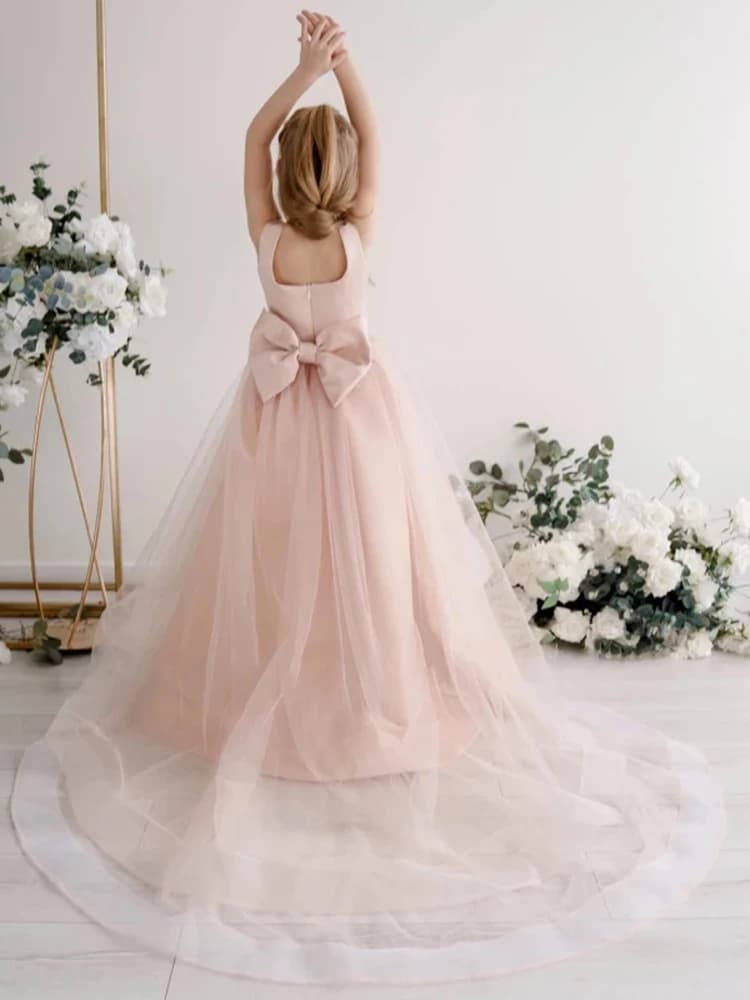 Abiti da ballo principessa in tulle con fiocco Abito da ragazza di fiori lungo fino al pavimento senza maniche in raso rosa per abito da prima comunione personalizzato
