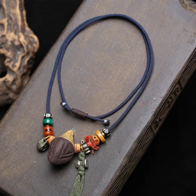 Hand-woven rope necklace with Tibetan Nangla Chacha pendant, knitted chain, copper clasp, Vajra bell and collarbone chain