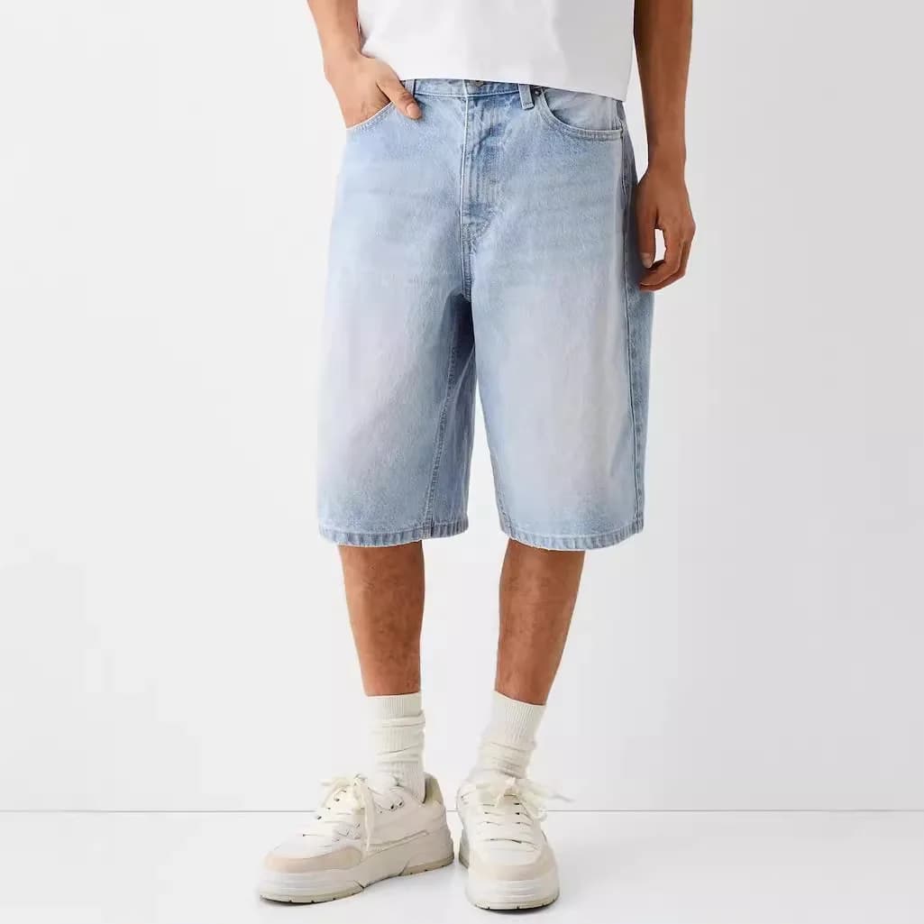 Pantaloni jeans al ginocchio a gamba larga larghi vintage lavati da uomo di nuova moda estiva Pantaloncini di jeans elastici americani da uomo