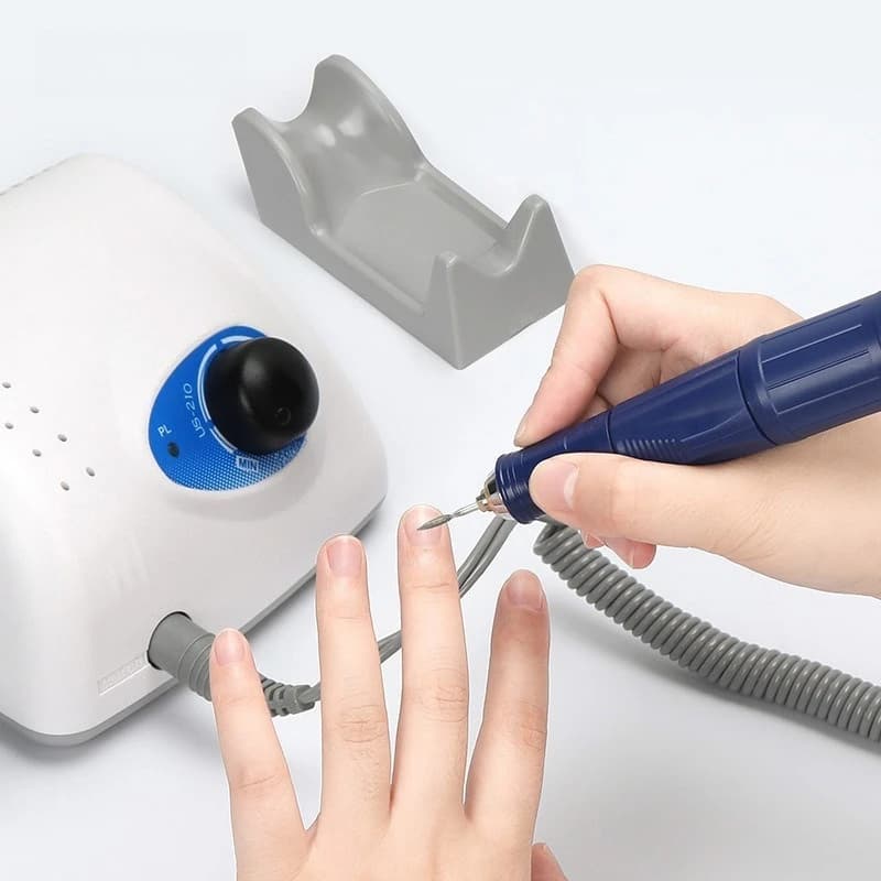 Grinder, nail grinder, polishing tool and manicure with grinding head