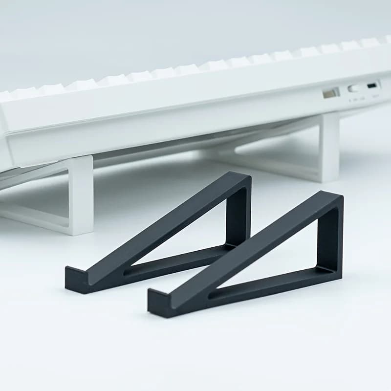 Support for keyboard, simple monitor support, raised corner for keyboard, comfortable typing, design without sliding bearing