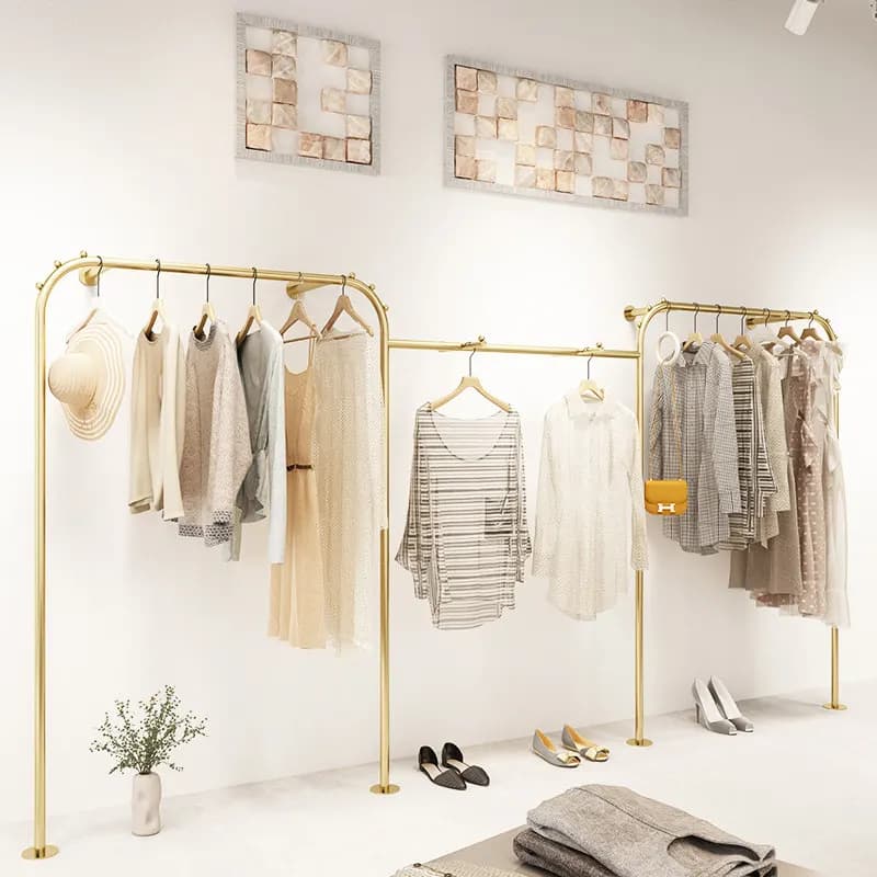 Exhibitor for clothing, special display for women's clothes, type from floor to ceiling against wall, side coat hangers, background
