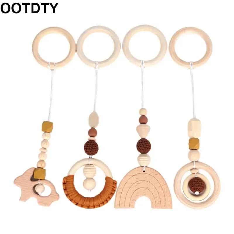 4 pz/set Baby dentizione allattamento sonaglio regali gioca palestra telaio passeggino pendenti pendenti anello in legno massaggiagengive molare