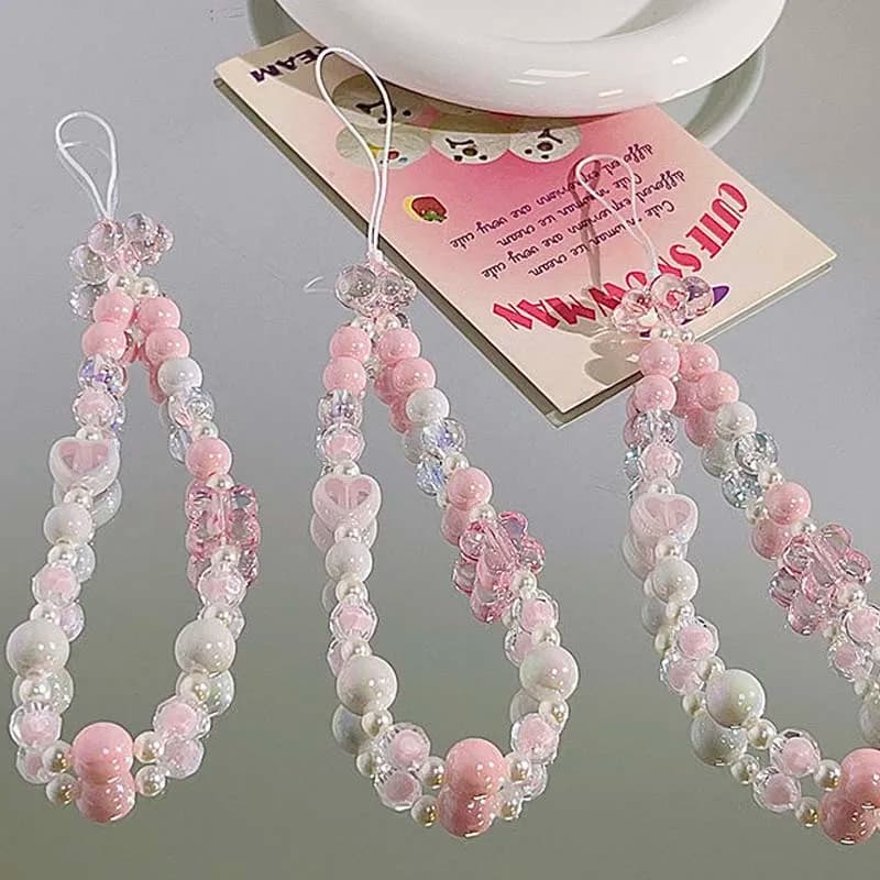 Bracciale con nuvola di cristallo rosa con ciondolo a forma di farfalla e fiore per iPhone Airpods, carino cordino per telefono con corda anti-smarrimento