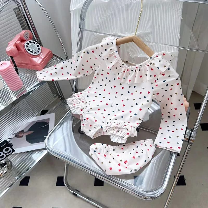 Nuovo costume da bagno per ragazze Estate Nuova protezione solare a maniche lunghe Ragazze Carino Backless Costume intero Swim 2025 Cuffia da nuoto gratuita