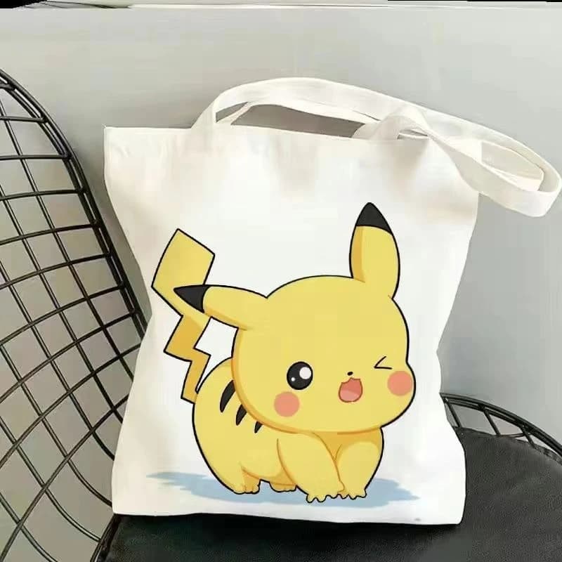 Borse di tela Pokemon Figure di Pikachu stampate anime Borse tote per la spesa Nuovo pendolare Borsa di stoccaggio semplice e versatile Regalo per ragazze e ragazzi