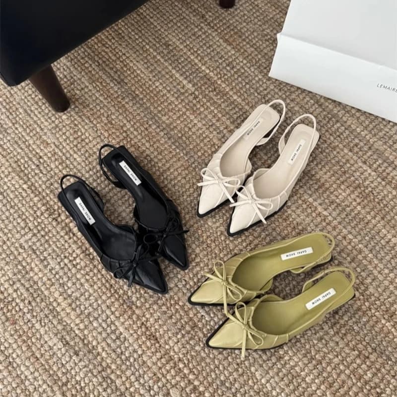 Estate nuova luce di lusso versione coreana moda temperamento semplice sandali avvolgenti con punta a punta donna tacco spesso cinturino da viaggio con fiocco sul retro
