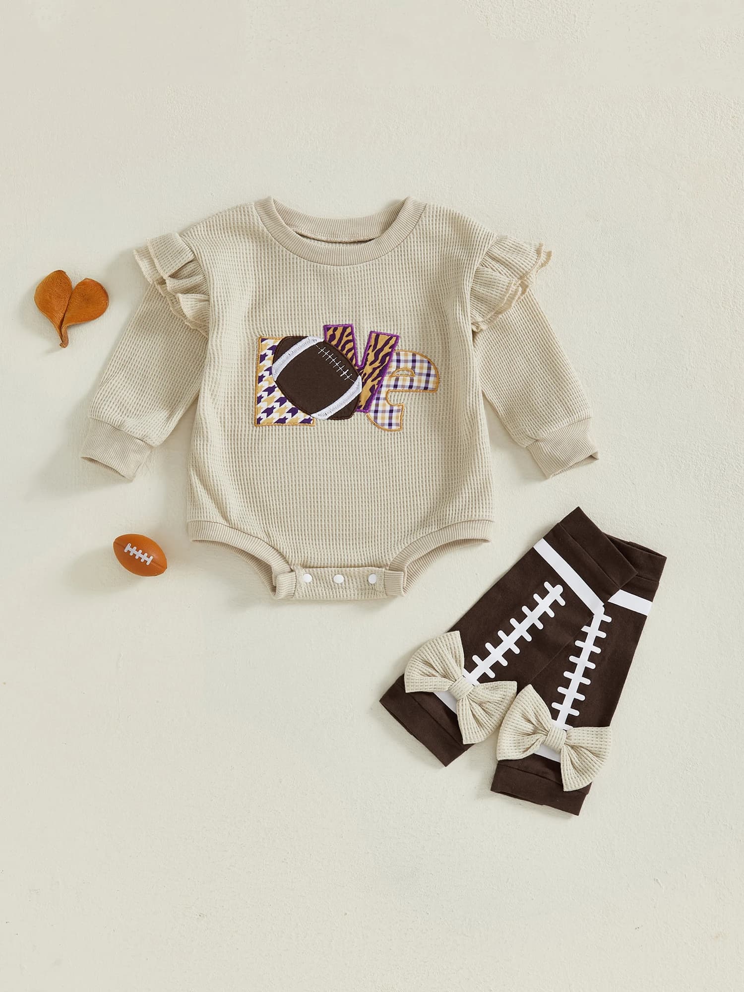Lovely baby set with floral print with matching band and leggings with volant. Nice autumn outfit for newborns