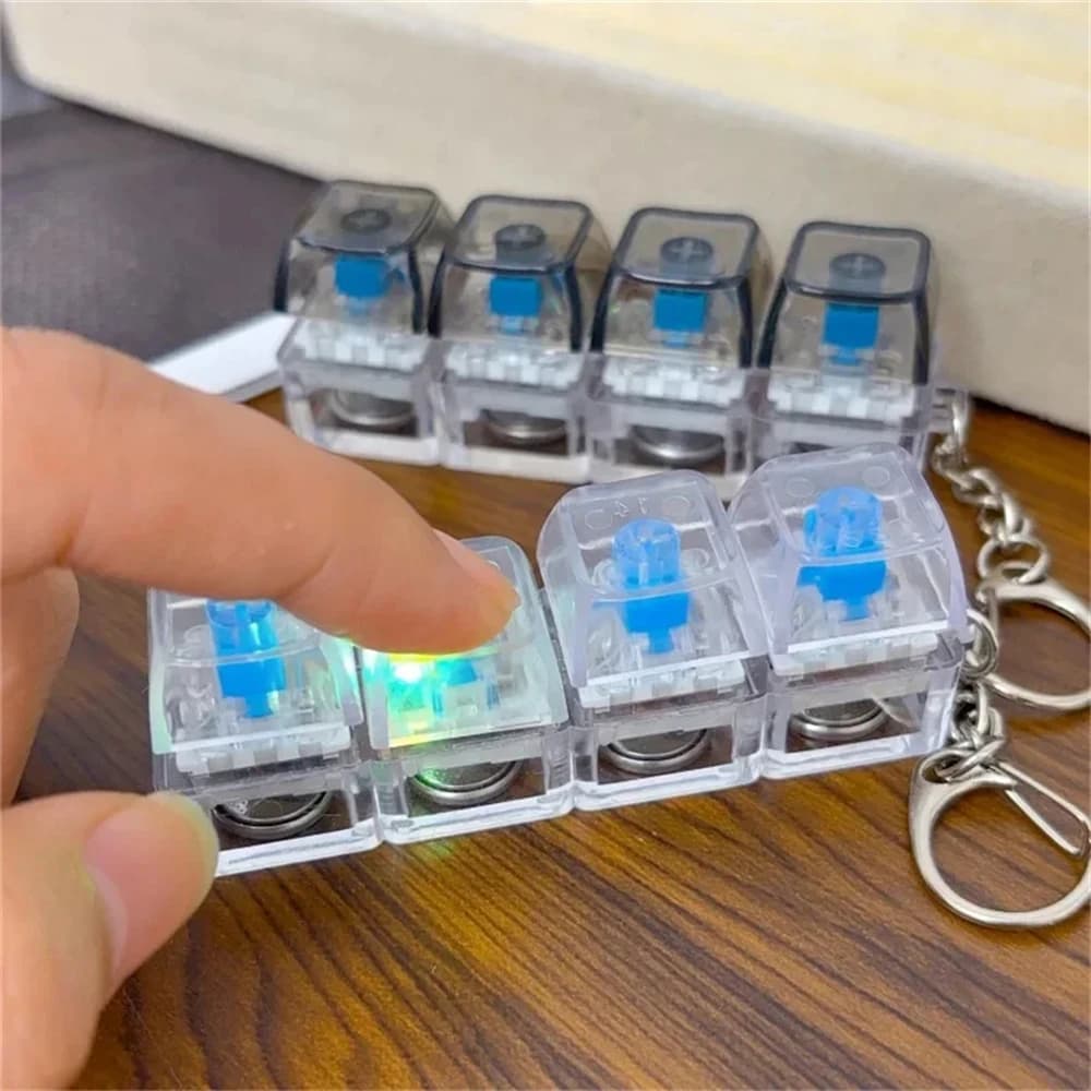 Portachiavi con tastiera a LED Fidget Toys Crystal Clicker Giocattolo sensoriale per alleviare lo stress Portachiavi con tastiera Fidget Gadget per adulti Bambini