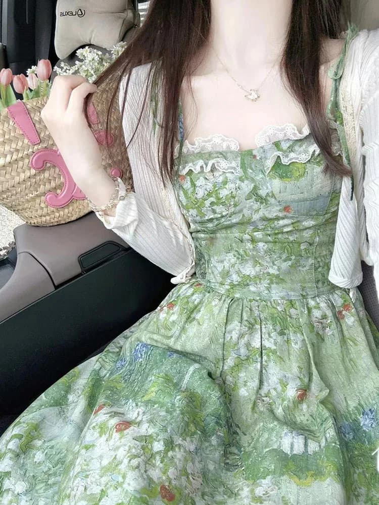 Gonna halter sexy floreale con pittura a olio verde francese estate femminile nuovo abito a due pezzi cardigan a maniche lunghe con protezione solare lunga per le vacanze.