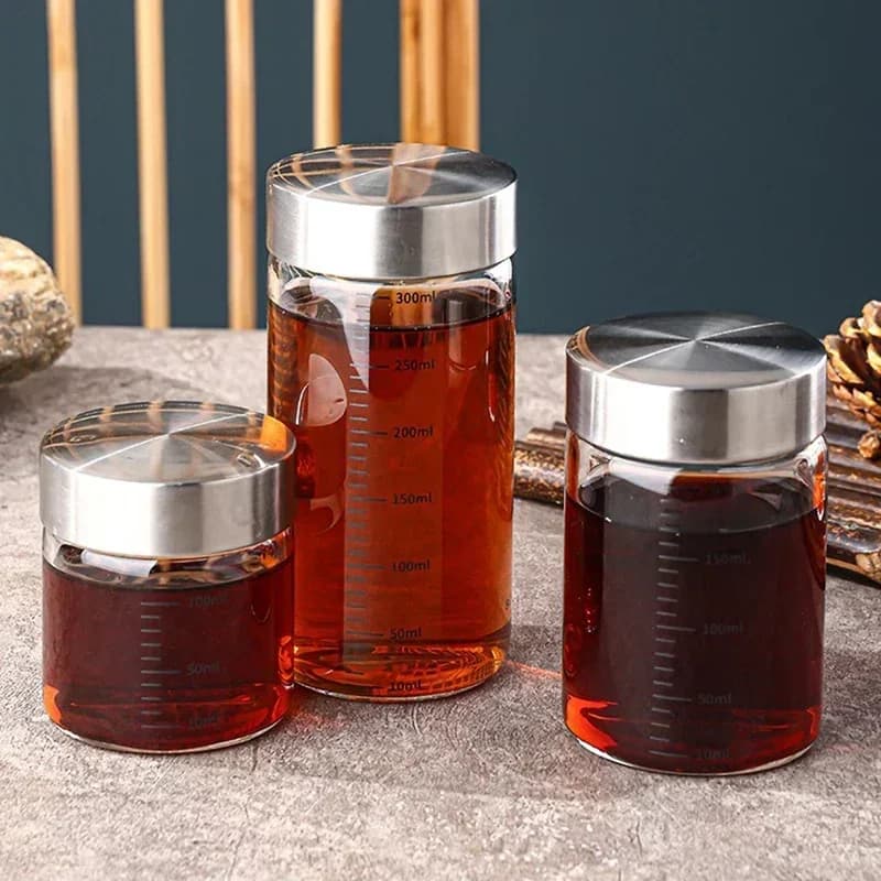 Bottiglia di vetro da 100-500 ml con scala Barattolo di vetro resistente al calore ad alto contenuto di borosilicato condimento da cucina Bottiglia di stoccaggio di spezie Gadget