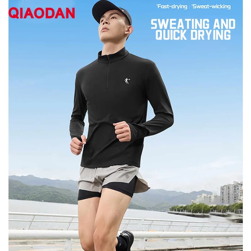 QIAODAN Feiying Maglietta a Maniche Lunghe Primavera 2026 Casual Traspirante Antistatica Abbigliamento Sportivo da Uomo QXBTL3253109R